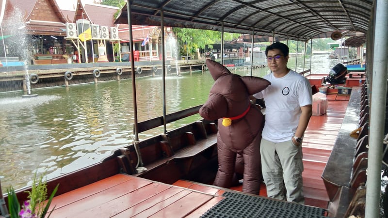 Inflatable dog on a boat in Thailand - World Animal Protection - Animals in disasters
